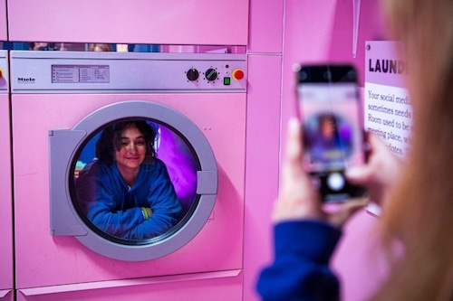 People visit the "Laundry room" inside Youseum on April 4, 2022, in Solna, near Stockholm.
Image: Jonathan Nackstrand / AFP People visit the "Laundry room" inside Youseum on April 4, 2022, in Solna, near Stockholm.
Image: Jonathan Nackstrand / AFP