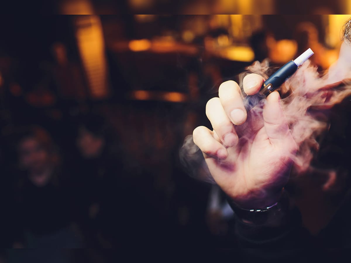 elf bar vape uk Electronic cigarettes emitting vapor on dark background, glamour, neon vibe  59844158 Stock Photo at Vecteezy