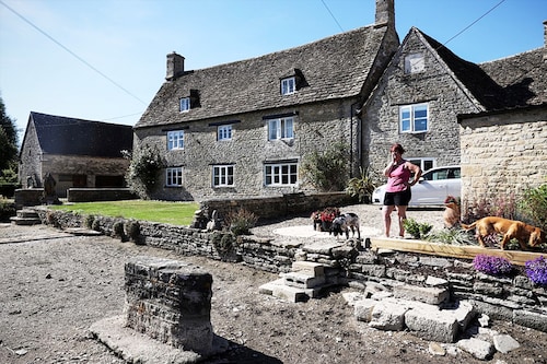 Sheila Ward stands on her driveway looking at the dried river bed of the Infant River Thames, in Ashton Keynes, England on August 8, 2022. Image: ADRIAN DENNIS / AFP Sheila Ward stands on her driveway looking at the dried river bed of the Infant River Thames, in Ashton Keynes, England on August 8, 2022. Image: ADRIAN DENNIS / AFP