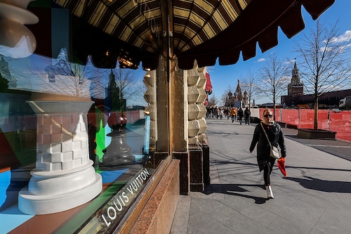 A woman walks past a closed Louis Vuitton boutique in the GUM department store in Red square in Moscow , Russia March 15, 2022.  
Image: Evgenia Novozhenina / Reuters