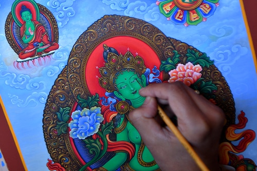 Paubha artist Ujay Bajracharya works on his rendition of the Green Tara, a goddess of compassion revered by Buddhists and Hindus in the country, in Lalitpur on the outskirts of Kathmandu.
Image: Prakash Mathena/ AFP Paubha artist Ujay Bajracharya works on his rendition of the Green Tara, a goddess of compassion revered by Buddhists and Hindus in the country, in Lalitpur on the outskirts of Kathmandu.
Image: Prakash Mathena/ AFP