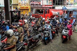A line for gas at a station near the residence of Mahinda Rajapaksa, the former prime minister of Sri Lanka, in the town of Tangalle, May 18, 2022. A frenzy of building on borrowed money in the Rajapaksa family’s home district illustrates the hubris and mismanagement that led the country into economic collapse.
Image: Atul Loke/The New York Times