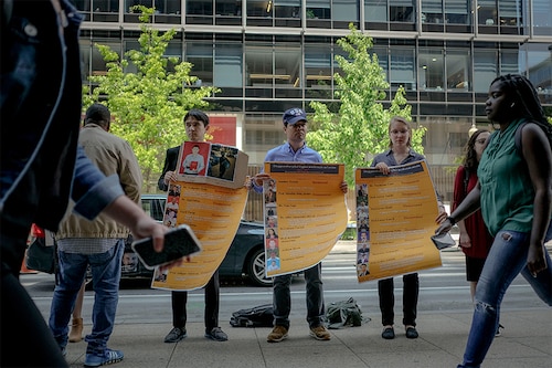 FILE — Uyghur supporters hold a rally encouraging sanctions against Chinese officials in Washington on Friday, May 3, 2019. For the many Uyghur activists who have campaigned — often at great personal cost — to bring China’s intense crackdown in Xinjiang to light, the United Nations report released on Aug. 31, 2022 that largely validated their claims was a powerful, if long-delayed, vindication. Image: Gabriella Demczuk/The New York Times