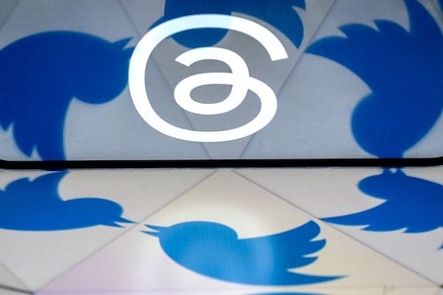 This photo illustration created in Washington, DC, on July 5, 2023, shows the logo for Threads, an Instagram app, reflected in the Twitter logo. - Facebook owner Meta"s new Threads app, meant to compete with Twitter, was available for pre-order on mobile app stores on iPhone and Android operating systems on July 5, 2023. Image: Stefani Reynolds / AFP This photo illustration created in Washington, DC, on July 5, 2023, shows the logo for Threads, an Instagram app, reflected in the Twitter logo. - Facebook owner Meta"s new Threads app, meant to compete with Twitter, was available for pre-order on mobile app stores on iPhone and Android operating systems on July 5, 2023. Image: Stefani Reynolds / AFP