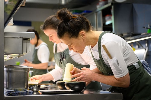 Hisa Franko restaurant"s head chef Melle Simon (R) preparing a Slovenian dish in Kobarid
Image: Jure Makovec / AFP