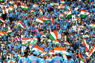 India fans in the stands celebrate after third umpire confirms the wicket of Pakistan"s Saud Shakeel, lbw bowled by India"s Kuldeep Yadav after a DRS review at the ICC Cricket World Cup 2023  India vs Pakistan match at  Narendra Modi Stadium, Ahmedabad, India on October 14, 2023    
Image: Amit Dave / Reuters