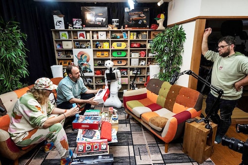 BenoÃ®t Theveny (L), aka "Tev", a French YouTuber in Japan, and game collector Ludovic Charles from France (2nd L)
Image:Richard A. Brooks / AFPÂ©