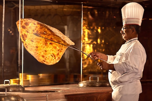 The legendary chef JP holds up the show-stopper Naan Bukhara, in Bukhara Restaurant, ITC Maurya, New Delhi. The legendary chef JP holds up the show-stopper Naan Bukhara, in Bukhara Restaurant, ITC Maurya, New Delhi.