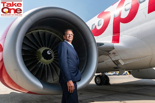 Ajay Singh, Chairman &amp Managing Director, Spicejet with Boeing 737 at the IGI airport, New Delhi, India.
Image: Amit Verma