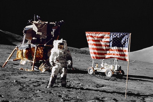 A NASA picture taken by US crew commander Eugene A. Cernan, on December 13, 1972 shows astronaut and geologist Harrison H. Schmitt seated in the Lunar Roving Vehicle. 
Image: Eugene A. Cernan / NASA / AFPÂ©