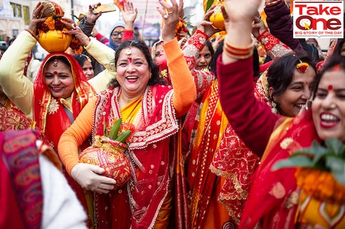 Women engaged in preparation and celebration ahead of the Ram Temple inauguration in Ayodhya. Image: Madhu Kapparath