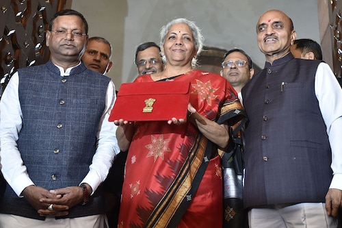 (File) Union Finance Minister Nirmala Sitaraman along with MOS finance ministers at Parliament House ahead of the presentation of the Union Budget 2023-24, on February 1, 2023 in New Delhi, India. Image: Sonu Mehta/Hindustan Times via Getty Images (File) Union Finance Minister Nirmala Sitaraman along with MOS finance ministers at Parliament House ahead of the presentation of the Union Budget 2023-24, on February 1, 2023 in New Delhi, India. Image: Sonu Mehta/Hindustan Times via Getty Images