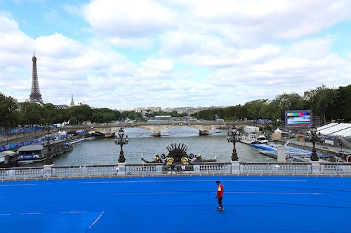 Around 6,000-7,000 athletes are set to sail down a six-kilometre (four-mile) stretch of the river Seine from the Austerlitz bridge in the east to the Eiffel Tower, on 85 barges and boats.
Image: Emmanuel Dunand / AFP© Around 6,000-7,000 athletes are set to sail down a six-kilometre (four-mile) stretch of the river Seine from the Austerlitz bridge in the east to the Eiffel Tower, on 85 barges and boats.
Image: Emmanuel Dunand / AFP©