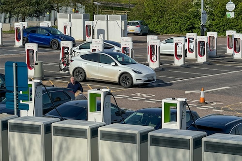 Electric cars including Teslas recharge at a charging area of a motorway service station on April 13, 2024 in Exeter, England. The European Union plans to ban all new sales of carbon-emitting petrol and diesel cars by 2035. Originally the UK planned to ban the sale of new petrol and diesel cars in Britain will by 2030, however this has recently put back still further.
Image: Matt Cardy/Getty Images Electric cars including Teslas recharge at a charging area of a motorway service station on April 13, 2024 in Exeter, England. The European Union plans to ban all new sales of carbon-emitting petrol and diesel cars by 2035. Originally the UK planned to ban the sale of new petrol and diesel cars in Britain will by 2030, however this has recently put back still further.
Image: Matt Cardy/Getty Images