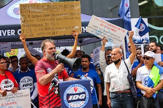 Uber driver Khalid Khattak speaks during a press conference at the Uber offices outside of the Falchi Building on June 26, 2024 in New York City. Uber drivers with the Independent Drivers Guild were joined by members of Justice for App Workers coalition as they staged a caravan protest and press conference to call on Uber to stop the lockouts of their apps for drivers that prevent them from working.   Image: Michael M. Santiago/Getty Images/AFP