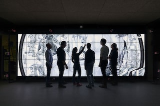 The Sanctuary on The Moon project team observes the contents of the "Life & Biology" disc at France"s National Institute for Research in Digital Science and Technology (Inria).
Image: Courtesy of Benedict RedgroveÂ©