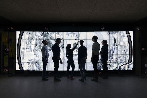 The Sanctuary on The Moon project team observes the contents of the "Life & Biology" disc at France"s National Institute for Research in Digital Science and Technology (Inria).
Image: Courtesy of Benedict RedgroveÂ©