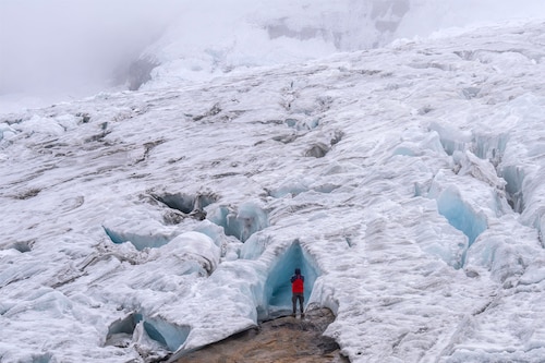 A tourist explores the Ritacuba Blanco glacier at the Natural National Park Nevado El Cocuy in Boyaca Department, Colombia. Image credit: Photography Luis ACOSTA / AFP© A tourist explores the Ritacuba Blanco glacier at the Natural National Park Nevado El Cocuy in Boyaca Department, Colombia. Image credit: Photography Luis ACOSTA / AFP©