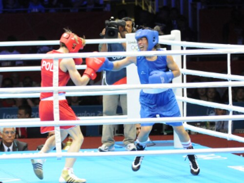 Mary Kom in her first round bout against Karolina Michalczuk. Photo: V Krishnaswamy Mary Kom in her first round bout against Karolina Michalczuk. Photo: V Krishnaswamy