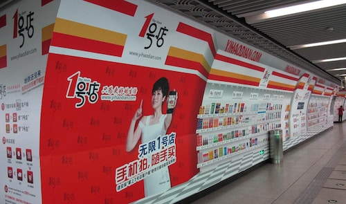 Yihaodian's futuristic virtual supermarket aisles in a Beijing subway station (Image courtesy: Yihaodian) Yihaodian's futuristic virtual supermarket aisles in a Beijing subway station (Image courtesy: Yihaodian)