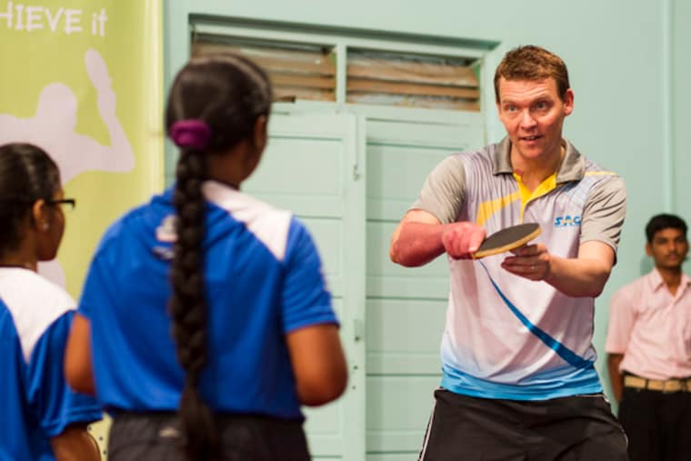 Peter Karlsson demonstrates the forehand topspin. Photo: Vikas Khot