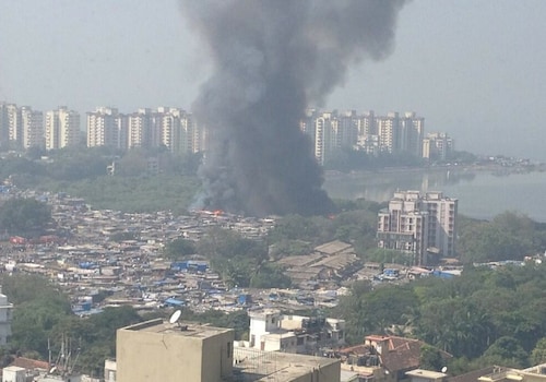 The fire blazes through the slums on Cuffe Parade (Image: @nonitakalra on twitter) The fire blazes through the slums on Cuffe Parade (Image: @nonitakalra on twitter)
