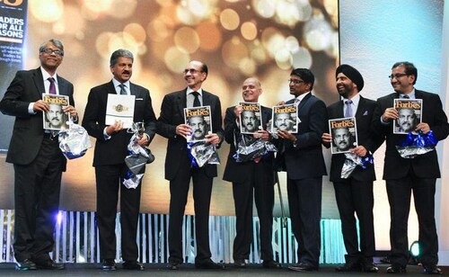 Anand Mahindra, Entrepreneur for the Year 2013, helps unveil the flagship issue at last year's ceremony.