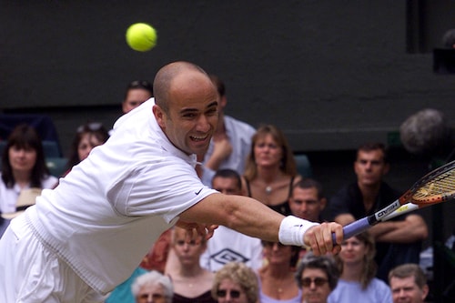 Andre Agassi of the U.S. plays a return to compatriot Pete Sampras of the U.S during the final of the Mens' Singles competition at the Wimbledon Tennis Championships (Image: Reuters)