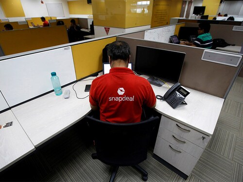 Employees work inside Snapdeal headquarters in Gurugram on the outskirts of New Delhi, India, April 3, 2017. Picture taken April 3. REUTERS/Adnan Abidi - RTX33YCD