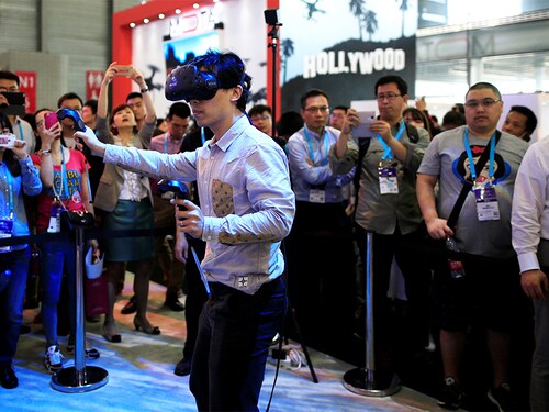 A man tests a virtual reality product, VIVE from Intel at CES (Consumer Electronics Show) Asia 2016 in Shanghai, China (Image:  Reuters/Aly Song)