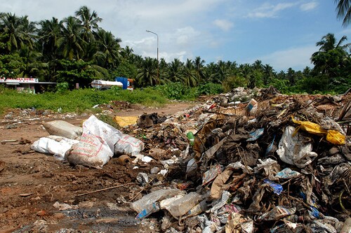 INDIA - OCTOBER 29: View of Garbage at Kovalam Beach, Kerala, India ( Beach, Boat, Tourist, Plants, Backwater, Workers, Fisherman Lake Resort ) (Photo by Mandar Deodhar/The India Today Group/Getty Images)