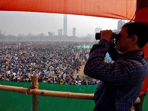 A police officer looks through a pair of binoculars during the "United India" rally attended by the leaders of India's main opposition parties ahead of the general election, in Kolkata, India, January 19, 2019. REUTERS/Rupak De Chowdhuri - RC1A22AD8FA0 A police officer looks through a pair of binoculars during the "United India" rally attended by the leaders of India's main opposition parties ahead of the general election, in Kolkata, India, January 19, 2019. REUTERS/Rupak De Chowdhuri - RC1A22AD8FA0