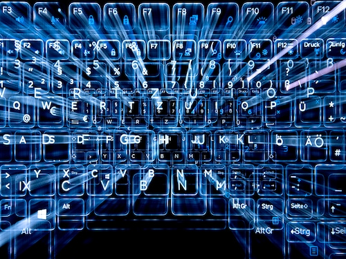 11 January 2019, Baden-Wuerttemberg, Stuttgart: ILLUSTRATION - Keys of an illuminated keyboard. (Shooting with Zoom Effect) Photo: Sebastian Gollnow/dpa (Photo by Sebastian Gollnow/picture alliance via Getty Images)