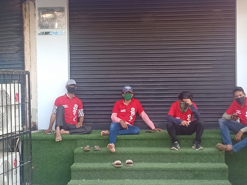 Zomato delivery boys outside Bandra's iconic Lucky restaurant say they have nowhere to go, as fewer people are ordering in during the Covid-19 lockdown. Image: Brian Carvalho
