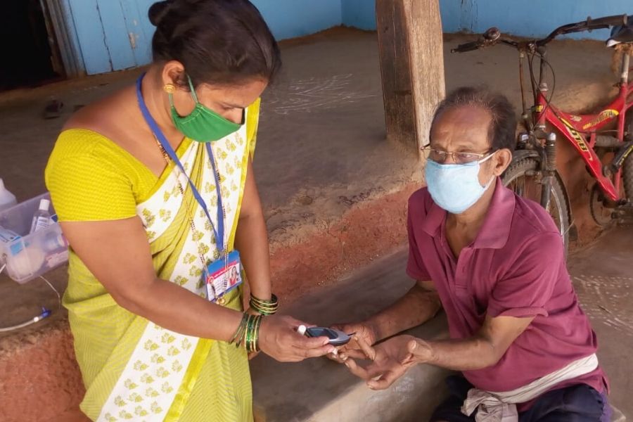 Sneha Murkar in the village screening people