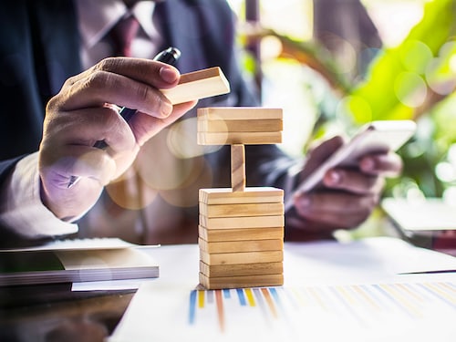 Planning, risk and strategy in business, business gambling placing wooden block