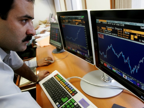 MUMBAI, INDIA  NOVEMBER 8, 2006: A heavy buying day for operators and retail investors as the Sensex crossed the 9000-mark after touching 9005.63, an intra-day historic high, and ending at a new closing peak of 8994.94 points at the Bombay Stock Exchange (BSE) on Monday. (Photo by Manoj Patil/Hindustan Times via Getty Images)