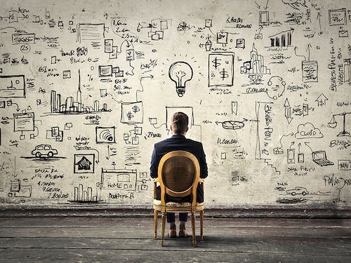 Businessman trying to solve problems