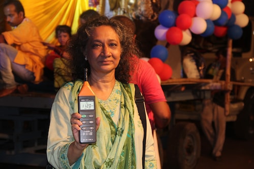 Sumaira Abdulali checking decibel levels at a festival in Mumbai