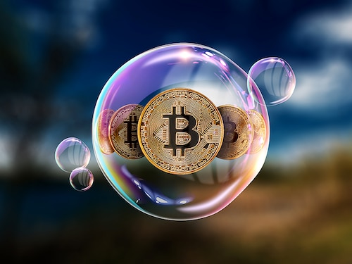 Gold Coins Bitcoin in a soap bubble. The concept of instability of the crypto currency, electronic money, the burning of the crypto currency.
Image: Shutterstock Gold Coins Bitcoin in a soap bubble. The concept of instability of the crypto currency, electronic money, the burning of the crypto currency.
Image: Shutterstock