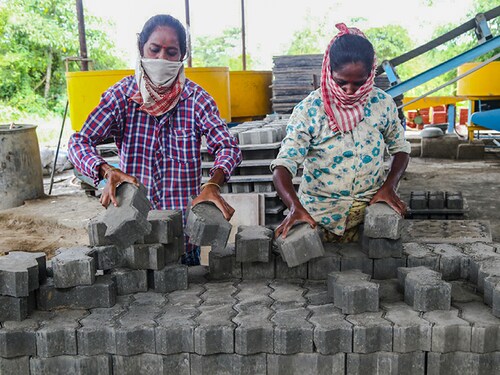 Women workers in Assam, India on August 7, 2020 continues their field work during pandemic as the Prime minister of India has introduced a new scheme for pandemic related economic package called 'Atmanirbhar Bharat' or ' Self reliant India mission. The lockdown has been removed from rural parts of India. (Photo by Dimpy Gogoi/NurPhoto via Getty Images)