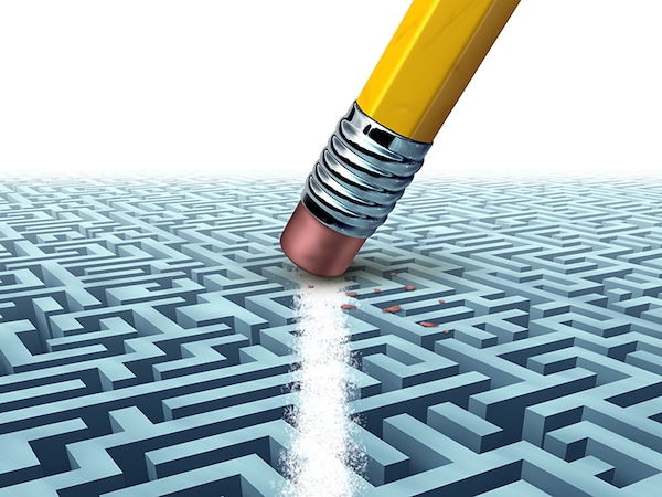 Solving a problem  and finding the best creative solution against a complicated and complex three dimensional maze having a clear shortcut path created by erasing the labyrinth with a pencil eraser.