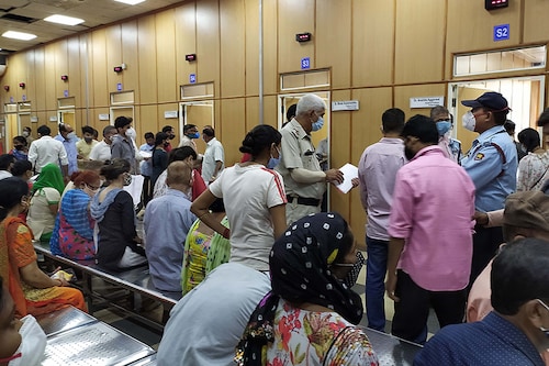 People waiting at the super speciality OPD centre at Ram Manohar Lohia (RML) hospital, on June 18, 2021 in New Delhi, India. Image: Arvind Yadav/Hindustan Times via Getty Images