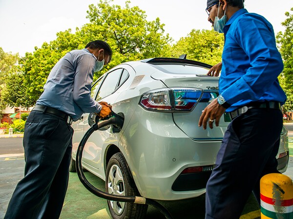 New Delhi/India - Aug 8 2020 : Drivers charging their Electric Car , this Charging stations around government offices have been used by government fleet vehicles,