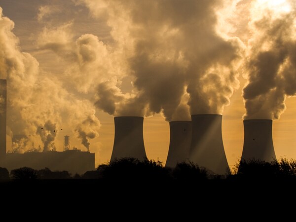 Factories and power station belching pollution.