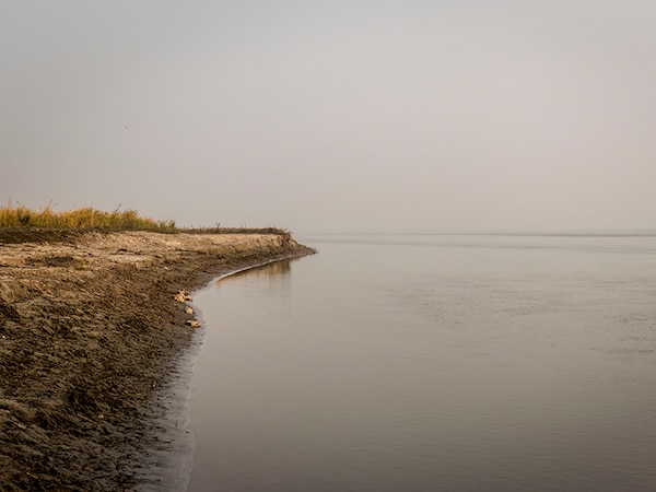 river edge showing soil erosion