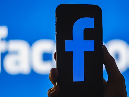 ROSTOV-ON-DON / RUSSIA - April 20 2020: Facebook logo on the smartphone screen in hand.