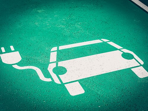 Parking symbol on the street for electric cars being charged