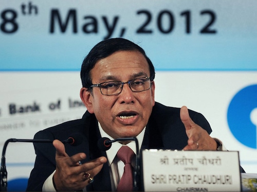 The chairman of the State Bank of India (SBI), Pratip Chaudhuri answers a question during a press conference in Kolkata on May 18, 2012.  SBI, a state-owned corporation which is the largest banking and financial services company in India by revenue, assets and market capitalization, organised the conference to announce the financial results and other future plans.  AFP PHOTO/Dibyangshu SARKAR (Photo by DIBYANGSHU SARKAR / AFP)