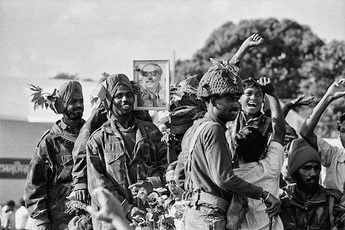 File - Dhaka: Indian soldiers rejoice after entering the capital of Bangladesh, then East Pakistan. The war between India and Pakistan on the eastern front formally came to an end as Pakistani forces surrendered unconditionally. Image credit - Getty Images
